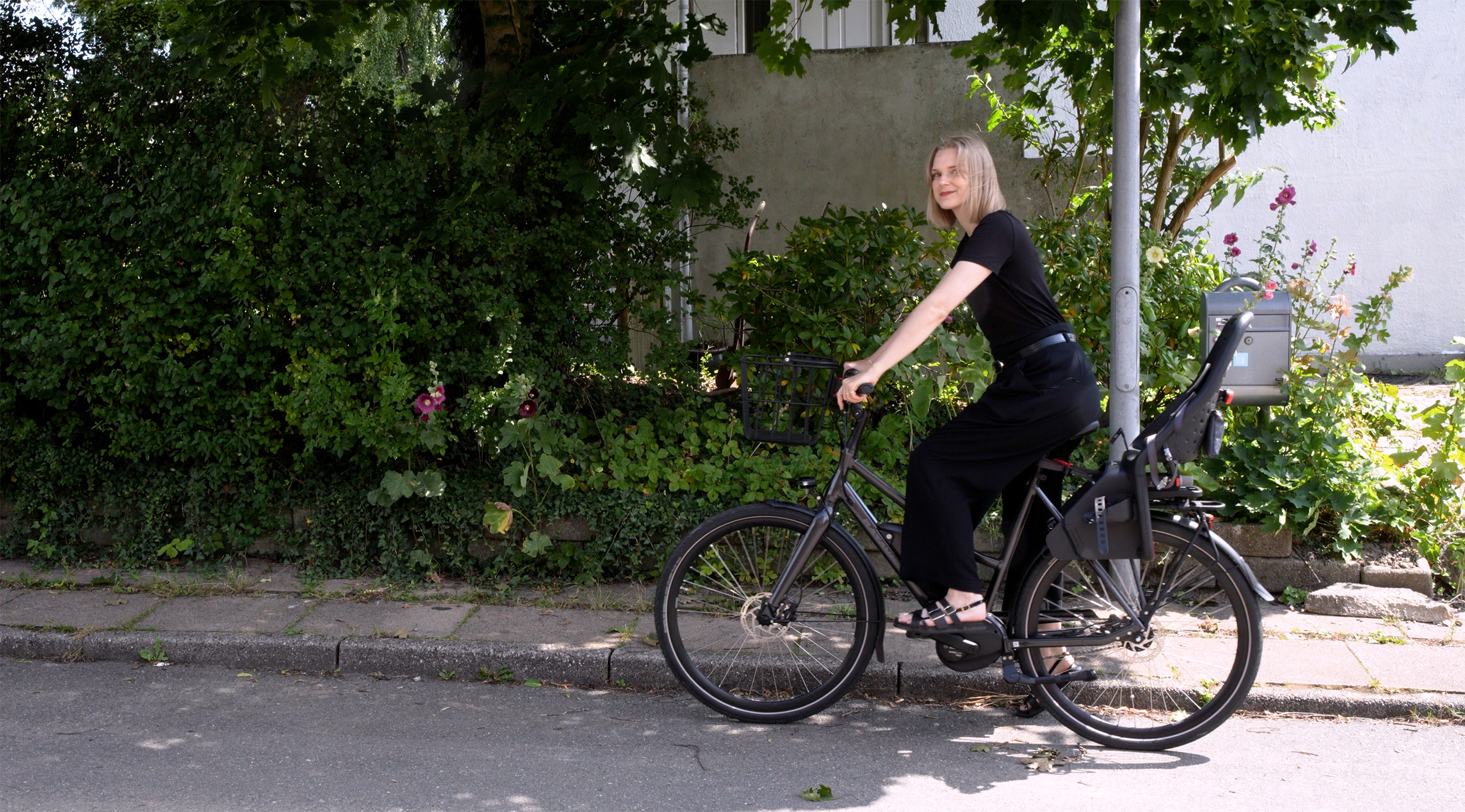 Siddende På Cykel