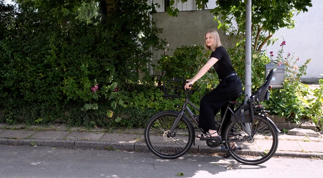 Siddende På Cykel